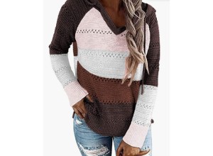 A woman wearing a sweater.
