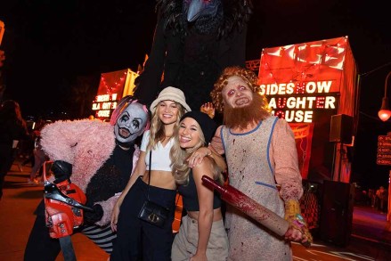 Olivia Holt and Madison Iseman at Universal Studios Halloween Horror Night in Hollywood on 10-20-22