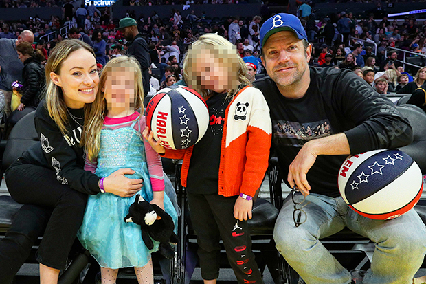 Olivia Wilde and Jason Sudeikis watch a basketball game with their kids in Feb. 2020