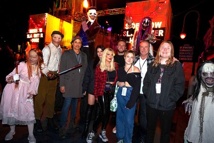 Tori Spelling with friends and family at Universal Studios Hollywood's Halloween Horror Nights on 10-27-22