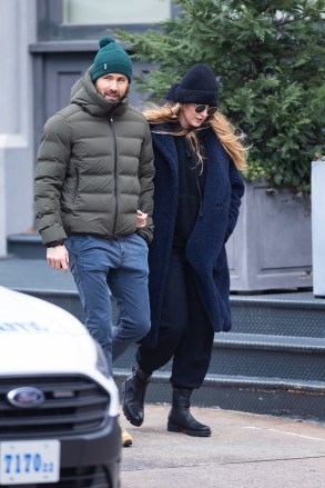New York, NY  - *EXCLUSIVE*  -  Blake Lively and Ryan Reynolds bundle up as the cute duo walk arm in arm in NYC this afternoon. Yesterday, T-Mobile announced it had bought Mint for $1.35 BILLION. Ryan is an investor, believed to be a pretty big one in the wireless company. The Deadpool star commented on the sale joking, "We are so happy T-Mobile beat out an aggressive last-minute bid from my mom Tammy Reynolds as we believe the excellence of their 5G network will provide a better strategic fit than my mom's slightly-above-average mahjong skills.’’ In 2020 Ryan sold his  Aviation American Gin as part of a deal worth an estimated $610 million. The actor also co-owns Welsh soccer team, Wrexham with friend and fellow actor, Rob McElhenney.Pictured: Blake Lively, Ryan Reynolds BACKGRID USA 15 MARCH 2023 USA: +1 310 798 9111 / usasales@backgrid.comUK: +44 208 344 2007 / uksales@backgrid.com*UK Clients - Pictures Containing ChildrenPlease Pixelate Face Prior To Publication*