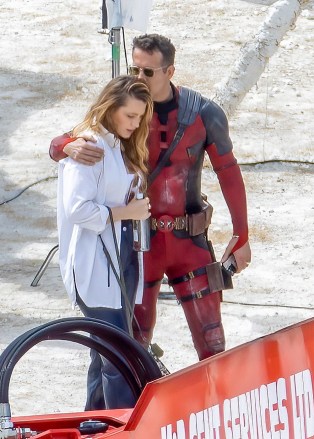 London, UNITED KINGDOM  - *EXCLUSIVE*  - Blake Lively visits the Deadpool 3 set with her sisters Lori and Robyn and their partners as Ryan Reynolds dressed as Deadpool plants a kiss on her head. Ryan's daughter was seen with a cute Wolverine toy as she spoke to her dad! Awkward!They have been filming in London for the new Deadpool film.Pictured: Ryan Reynolds, Blake Lively, Lori Lively, Robyn LivelyBACKGRID USA 12 JULY 2023 BYLINE MUST READ: Click News and Media / BACKGRIDUSA: +1 310 798 9111 / usasales@backgrid.comUK: +44 208 344 2007 / uksales@backgrid.com*UK Clients - Pictures Containing ChildrenPlease Pixelate Face Prior To Publication*
