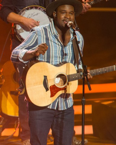 From left, Dexter Roberts, Darius Rucker, and CJ Harris perform on stage at the American Idol XIII finale at the Nokia Theatre at L.A. Live, in Los Angeles
American Idol XIII Finale - Show, Los Angeles, USA