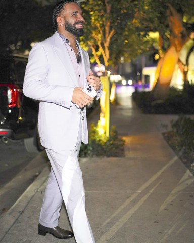 Celebrities attend Drake's 36th birthday party in Miami, FL. Drake rented out the entire restaurant Sexy Fish in Brickell for the event. Guests included DJ Khaled, Lil Baby, 21 Savage, Chaney Jones, Zack Bia, Alix Earle and Love Island stars Genny Shawcross and Emily Salch.

Pictured: Drake
Ref: SPL5496929 251022 NON-EXCLUSIVE
Picture by: Pichichipixx / SplashNews.com

Splash News and Pictures
USA: +1 310-525-5808
London: +44 (0)20 8126 1009
Berlin: +49 175 3764 166
photodesk@splashnews.com

World Rights