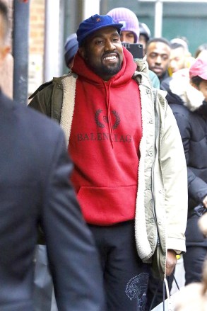 ** AUTHORITY: US ONLY, AUSTRALIA, CANADA, NEW ZEALAND ** New York, NY - Rapper Kanye West was spotted shopping at Balenciaga in New York.  Kanye, who drew a large crowd while he was shopping, was escorted back to the Mercer by a police officer after his shopping trip.  comUK: +44 208 344 2007 / uksales@backgrid.com*UK Clients - Pictures with children Please highlight faces before publishing *