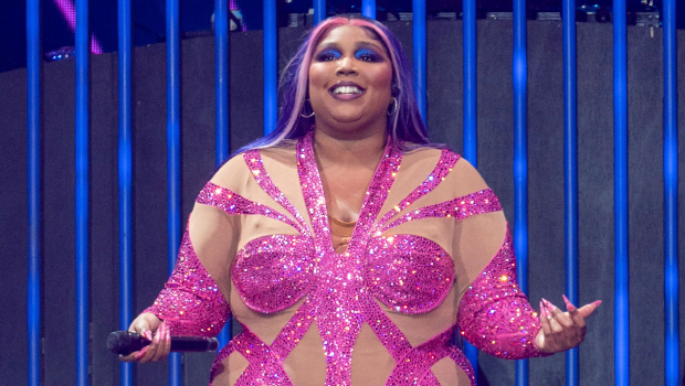 Lizzo Gets Completely Naked & Dresses Up As Miss Piggy With A Snake For Halloween
