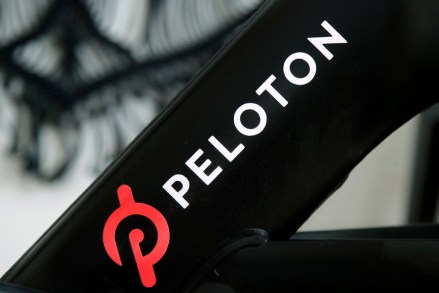 The Peloton logo on a Peloton exercise bike in San Francisco. Safety regulators have warned people with children and pets to stop using his Peloton treadmills immediately after one child died and nearly 40 were injured.The U.S. Consumer Product Safety Commission has received reports of children and pets being pulled under the rear rollers of treadmills, pinned and trapped, leading to fractures, scrapes and the death of one child. stated Peloton Safety Warning, San Francisco, United StatesUSA - November 19, 2019