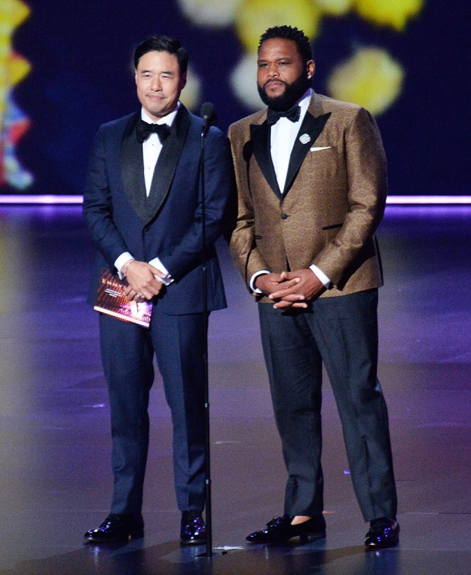 Randall Park and Anthony Anderson present during the 71st annual Primetime Emmy Awards