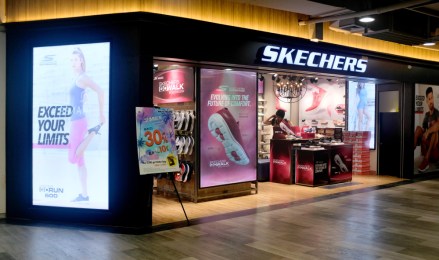 Bangkok, Thailand - April 8, 2019: Exterior shop facade of Skechers Shoes Outlet at MBK Center; shutterstock ID 1393581929; purchase_order: photo;