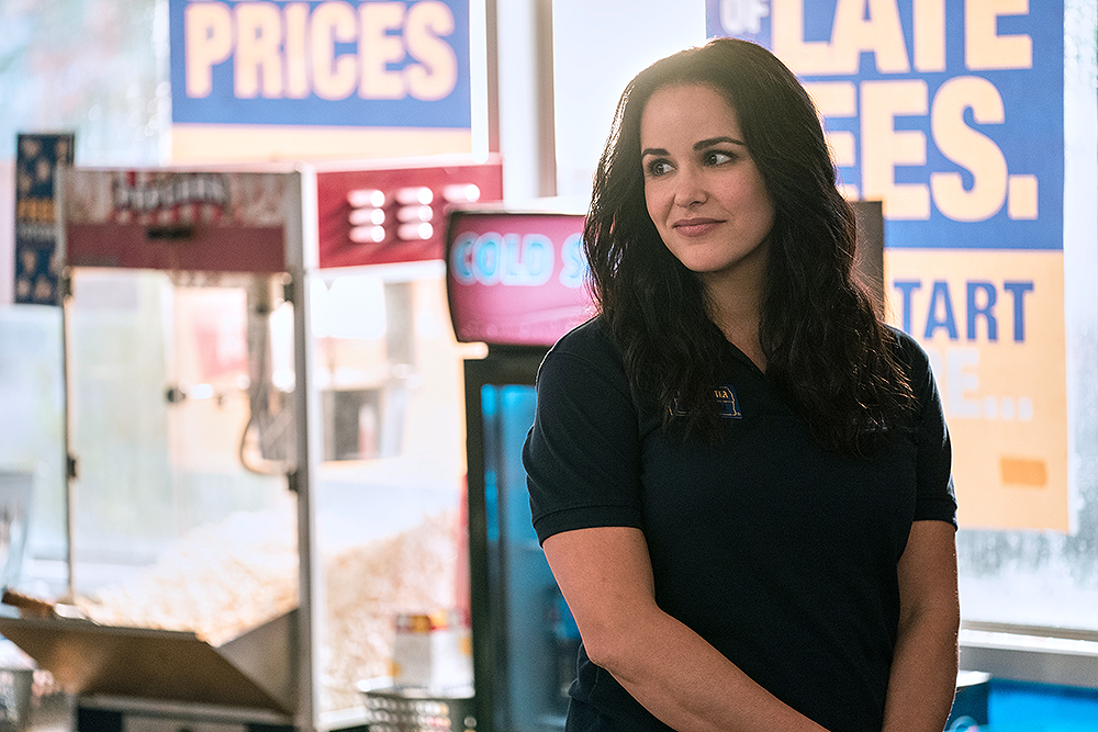 Blockbuster. Melissa Fumero as Eliza in episode 107 of Blockbuster. Cr. Ricardo Hubbs/Netflix © 2022