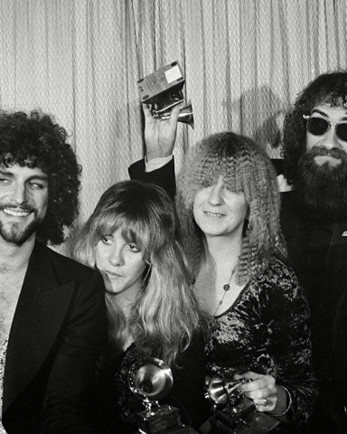 Lindsey Buckingham, Stevie Nicks, Christine McVie, Mick Fleetwood, John McVie Members of the rock group Fleetwood Mac celebrate their Grammy Award in Los Angeles, . From left: Lindsey Buckingham, Stevie Nicks, Christine McVie, Mick Fleetwood, and John McVie
Grammys Fleetwood Mac, Los Angeles, USA