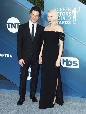 26th Annual Screen Actors Guild Awards held at the Shrine Auditorium in Los Angeles, USA on January 19, 2020.Pictured: Michelle Williams,Thomas KailRef: SPL5172462 190120 NON-EXCLUSIVEPicture by: Lumeimages / SplashNews.comSplash News and PicturesUSA: +1 310-525-5808London: +44 (0)20 8126 1009Berlin: +49 175 3764 166photodesk@splashnews.comWorld Rights