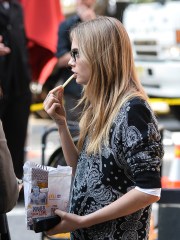 Cara Delevingne seen eating french fries and cheese burger from McDonald Pictured: Cara DelevingneRef: SPL631338 151013 NON-EXCLUSIVEPicture by: SplashNews.comSplash News and PicturesUSA: +1 310-525-5808London: +44 (0)20 8126 1009Berlin: +49 175 3764 166photodesk@splashnews.comWorld Rights