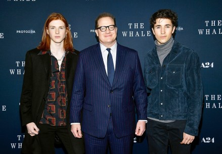 Actors Brendan Fraser, center, posing for the premiere with his sons Leland Fraser, left, and Holden Fraser "whale" Premiere at Alice Tully Hall, New York New York "whale"New York, United States - 29 November 2022