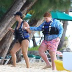 EXCLUSIVE: Canadian-American actor Brendan Fraser is spotted riding a jet ski at the beach in Barbados with his wife and kids