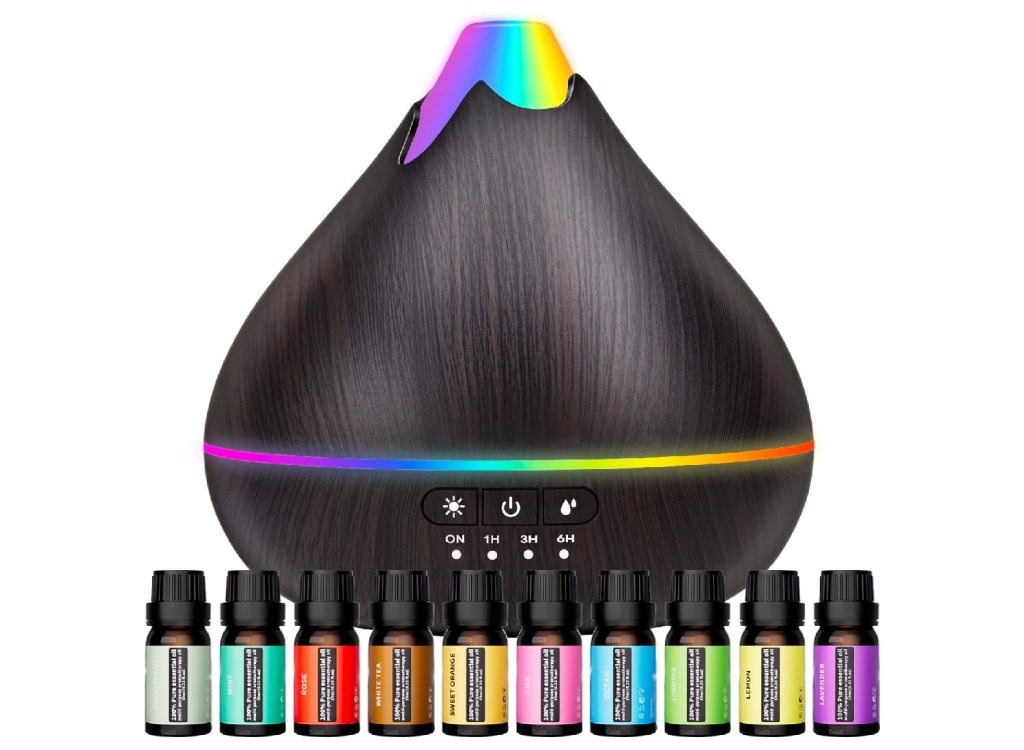 Essential oil diffuser with bottles of essential oils