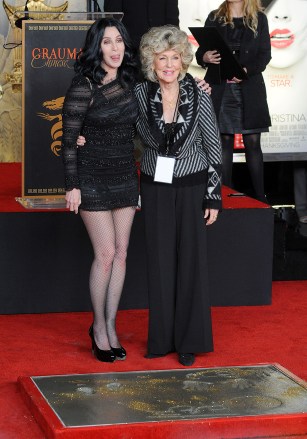 Cher poses with her mother Georgia Holt after adding her hands and footprints to the famous impressions set in concrete, during a ceremony in the forecourt of the Grauman's Chinese Theatre in the Hollywood section of Los Angeles on November 18, 2010
Cher Grauman's Hands & Footprint Ceremony, Los Angeles, California, United States - 19 Nov 2010