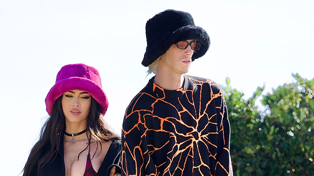 Megan Fox and Machine Gun Kelly Twin wear fur bucket hats while out for lunch in Los Angeles: photos