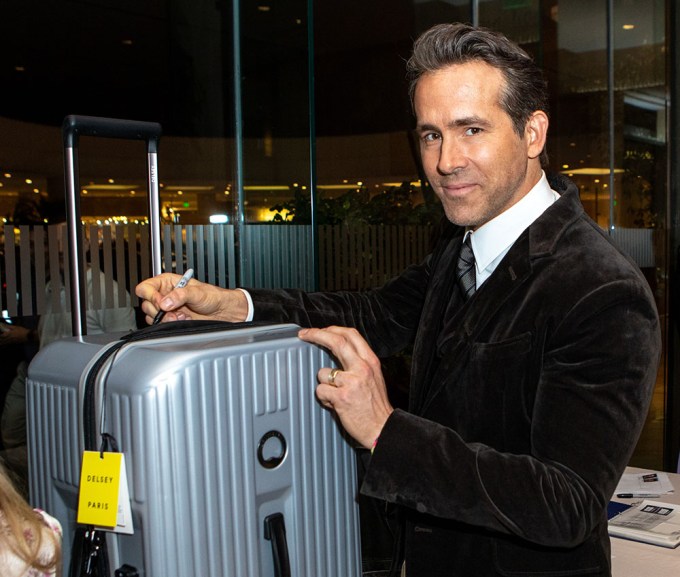 Ryan Reynolds Signs Luggage For American Cinematheque Charity Auction