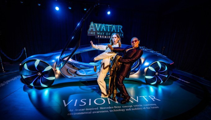Raven-Symoné & Miranda Maday Pose with the Mercedes-Benz VISION AVTR at world premiere of AVATAR