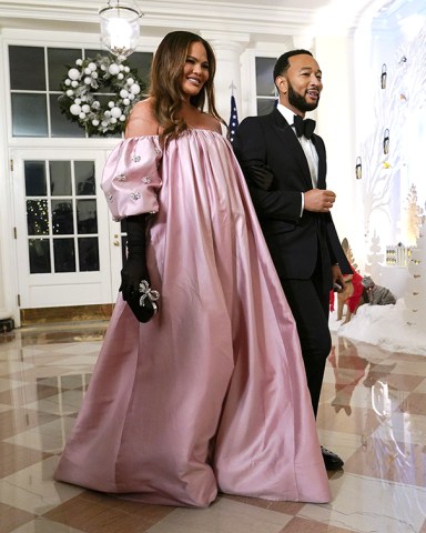 Chrissy Teigen, left, and John Legend arrive for the State Dinner with President Joe Biden and French President Emmanuel Macron at the White House in Washington
France, Washington, United States - 01 Dec 2022
