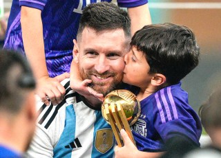 Editorial Use OnlyMandatory Credit: Photo by Dave Shopland/Shutterstock (13670813db)Ciro, youngest son of Lionel Messi of Argentina, gives his father a kiss as he lifts the FIFA Golden Ball award following the trophy liftArgentina v France, FIFA World Cup 2022, Final, Football, Lusail Stadium, Al Daayen, Qatar - 18 Dec 2022