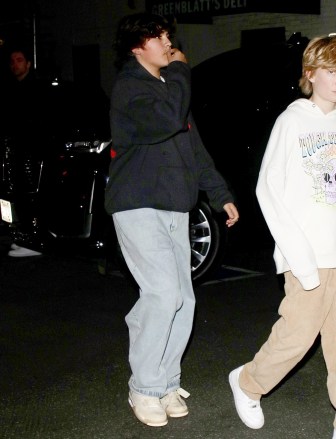 West Hollywood, CA - Scott Disick holds his son Reign by the hand as he arrives at Mason's Bar Mitzah in West Hollywood.  Pictured: Mason Disick BACKGRID USA 17 DECEMBER 2022 USA: +1 310 798 9111 / usasales@backgrid.com UK: +44 208 344 2007 / uksales@backgrid.com *UK Clients - Pictures Containing Children Please Pixelate Face Prior To Publication*