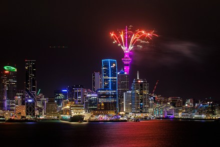 Auckland welcomes the 2023 New Year with fireworks from the Sky Tower.  Auckland is the first city to celebrate New Year Auckland welcomes New Year 2023, Auckland, New Zealand - 31 December 2022