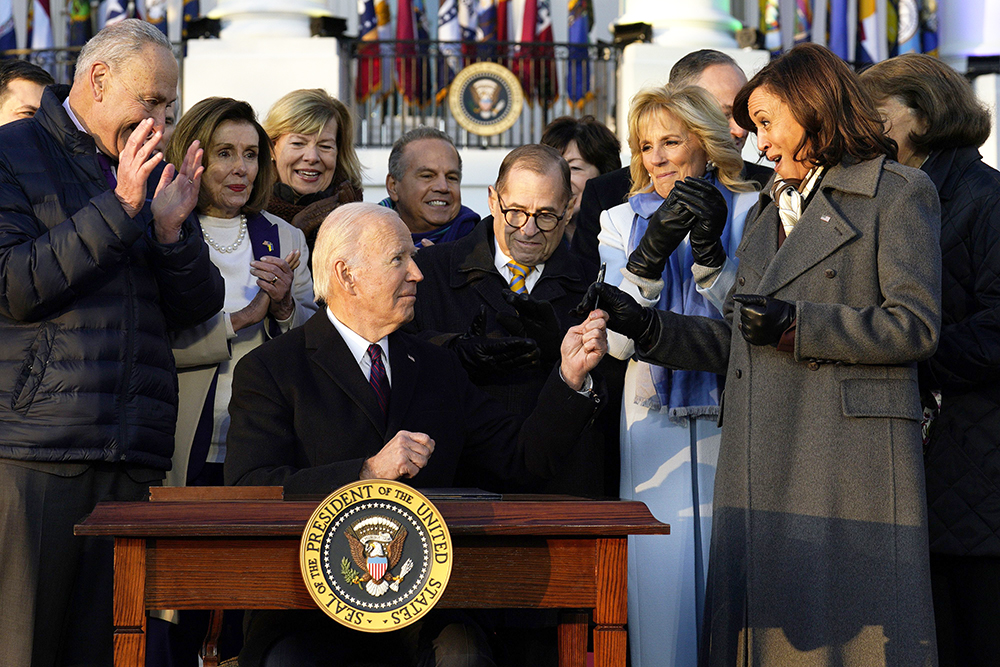 U.S. President Joe Biden signs the Respect for Marriage Acton during a ceremony on the South Lawn of the White House in Washington, DC on Tuesday, December 13, 2022.   The law codifies same-sex and interracial marriages.
Joe Biden Signs the Respect for Marriage Acton, Washington, District of Columbia, United States - 13 Dec 2022