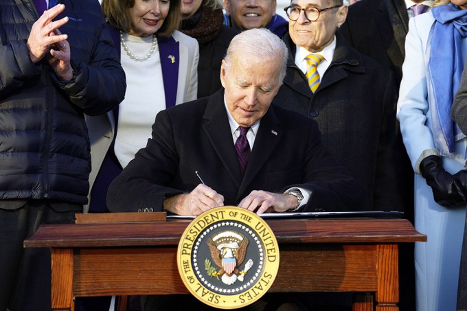 President Joe Biden Signs The Act Into Law