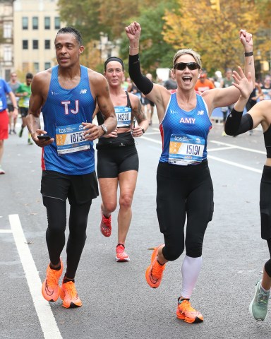 Amy Robach and T.J. Holmes run through Harlem in the New York City Marathon in New York City, NY, USA.

Pictured: Loutelious "T. J." Holmes,Jr.,Amy Robach
Ref: SPL5500250 061122 NON-EXCLUSIVE
Picture by: Christopher Peterson / SplashNews.com

Splash News and Pictures
USA: +1 310-525-5808
London: +44 (0)20 8126 1009
Berlin: +49 175 3764 166
photodesk@splashnews.com

World Rights