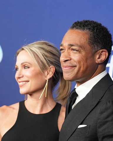 NEW YORK, NEW YORK - MAY 17: Amy Robach and TJ Holmes attends the 2022 ABC Disney Upfront at Basketball City - Pier 36 - South Street on May 17, 2022 in New York City.2022 ABC Disney Upfront, New York City, United States - 17 May 2022