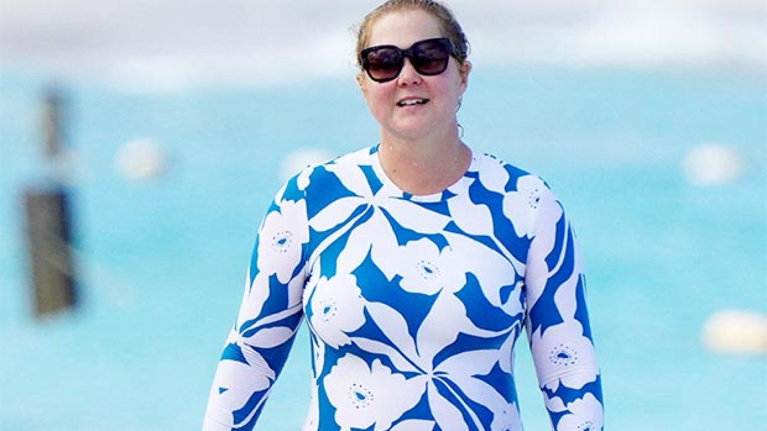 Amy Schumer Rocks Blue Floral Swimsuit In St. Barts Photos Hollywood