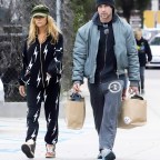 EXCLUSIVE: A sad looking Denise Richards seen out holiday shopping in onesie with husband Aaron Phypers