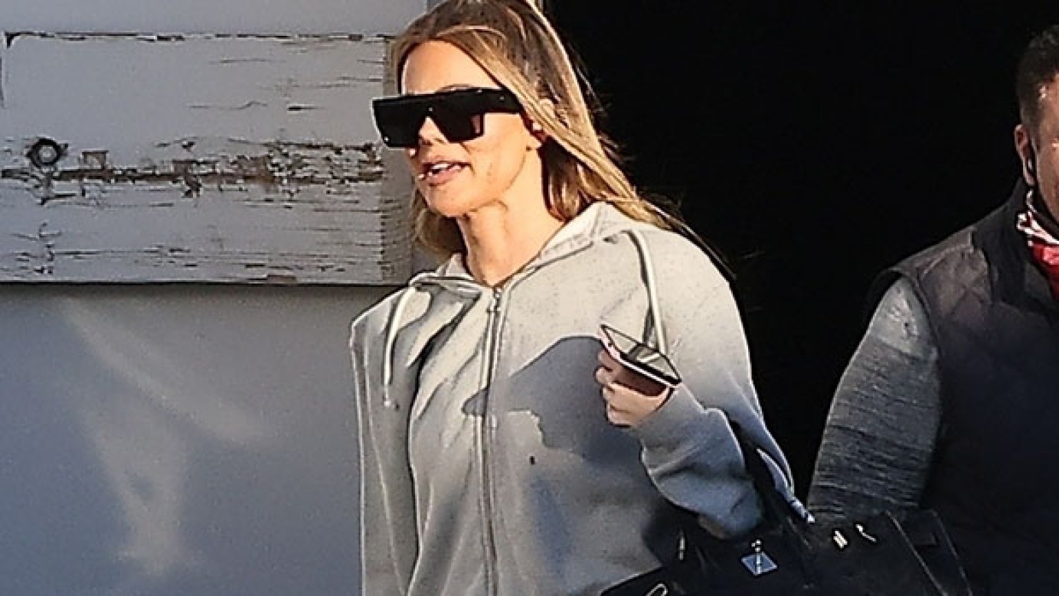 Khloe Kardashian Rocks Gray Sweatpants & Yeezy Sneakers: Photos