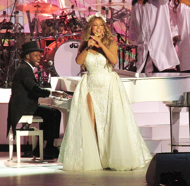 Beryl TV mariah-carey-slit-gown-embed1 Mariah Carey Wears White Gown For NYC Christmas Show: Photos – Hollywood Life Entertainment 