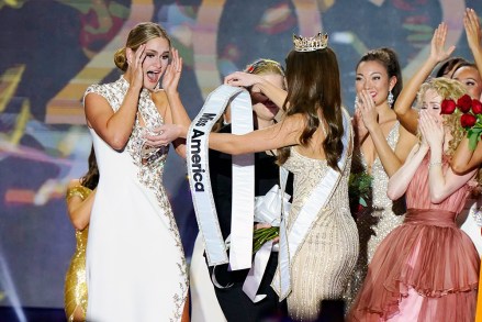 Miss Wisconsin Grace Stanke, left, is presented with the Miss America 2023 sash by Miss America 2022 Emma Broyles, center, after Stanke is named the winner of the competition at Mohegan Sun casino, in Uncasville, Conn
Miss America, Uncasville, United States - 15 Dec 2022