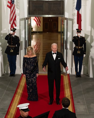 United States President Joe Biden and first lady Dr. Jill Biden welcome President Emmanuel Macron and Brigitte Macron of France to a State Dinner, in their honor, on the North Portico of the White House, in Washington, DC on Thursday, December 1, 2022Credit: Cliff Owen / Pool via CNPPictured: Joe Biden,Jill Biden,Emmanuel MacronRef: SPL5507281 011222 NON-EXCLUSIVEPicture by: Ron Sachs/CNP / SplashNews.comSplash News and PicturesUSA: +1 310-525-5808London: +44 (0)20 8126 1009Berlin: +49 175 3764 166photodesk@splashnews.comWorld Rights, No France Rights