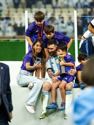Editorial Use OnlyMandatory Credit: Photo by Kieran McManus/Shutterstock (13670809hp)Lionel Messi of Argentina celebrates with his family after winning the World CupArgentina v France, FIFA World Cup 2022, Final, Football, Lusail Stadium, Al Daayen, Qatar - 18 Dec 2022
