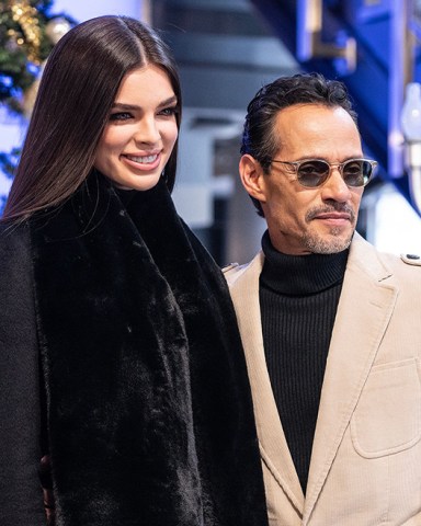 Nadia Ferreira and Marc Anthony pose on grand staircase during visit to Empire State Building. Marc Anthony helps to ceremonial lighting of ESB in gold on Maestro Cares golden anniversary.
NY: Marc Anthony visits Empire State Building, New York, United States - 05 Dec 2022