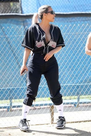 Calabasas, CA  - *EXCLUSIVE*  - Kim, Khloe and Kourtney Kardashian are joined by Kris and Kendall Jenner for a game of softball in Calabasas with friends. The Kardashian clan gathers for pictures after the game with Jonathan Cheban, Corey Gamble and Moises Arias. The ladies got some expert coaching advice from former Yankee Alex Rodriguez. Kim left her Calabasas Peaches Jersey unbuttoned enough to show off some cleavage.Pictured: Kim KardashianBACKGRID USA 8 MARCH 2018 BYLINE MUST READ: BAHE / BACKGRIDUSA: +1 310 798 9111 / usasales@backgrid.comUK: +44 208 344 2007 / uksales@backgrid.com*UK Clients - Pictures Containing ChildrenPlease Pixelate Face Prior To Publication*