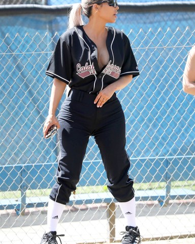 Calabasas, CA  - *EXCLUSIVE*  - Kim, Khloe and Kourtney Kardashian are joined by Kris and Kendall Jenner for a game of softball in Calabasas with friends. The Kardashian clan gathers for pictures after the game with Jonathan Cheban, Corey Gamble and Moises Arias. The ladies got some expert coaching advice from former Yankee Alex Rodriguez. Kim left her Calabasas Peaches Jersey unbuttoned enough to show off some cleavage.

Pictured: Kim Kardashian

BACKGRID USA 8 MARCH 2018 

BYLINE MUST READ: BAHE / BACKGRID

USA: +1 310 798 9111 / usasales@backgrid.com

UK: +44 208 344 2007 / uksales@backgrid.com

*UK Clients - Pictures Containing Children
Please Pixelate Face Prior To Publication*