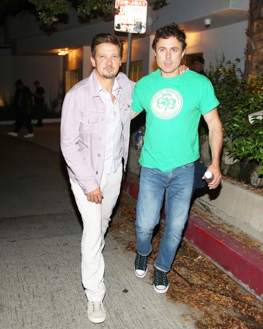 west hollywood, CA  - Actor Jeremy Renner brings a cheerful demeanor to Kate Beckinsale's 50th birthday celebration, joined by Casey Affleck, despite his ongoing recovery from a recent serious accident.

Pictured: Jeremy Renner, Casey Affleck

BACKGRID USA 30 JULY 2023 

USA: +1 310 798 9111 / usasales@backgrid.com

UK: +44 208 344 2007 / uksales@backgrid.com

*UK Clients - Pictures Containing Children
Please Pixelate Face Prior To Publication*