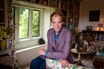 Julian Sands 'My Haven' in his Sitting room/library
'My Haven' Julian Sands photoshoot, UK - 08 Jul 2020
1.Ice axe  
2.My personal copy of Ms E Citkowitz's (Julian's wife) The Shades
3.Fossil collection including a tree found in the River Aire in the 1960s.  
4.Yoga Mat given to me by my teacher + photo of Yoga master
5.A silver filigree box given to me by my mother
6.A carpet l have had since drama school
7.Ceramic piece made for me by my sister in law who is a potter
8.Derek Jarman painting.
9.Harold Pinter biography by Michael Billington +photo and flyer
10.Laurence Olivier signed pic.
11.A collected poems by David Hare
12.'Room with a View' drawing done of me and Helena by the set artist Patrick Hamilton 
13.A portrait JS by daughter many years ago. I hold it dear and the likeness couldn't be better.