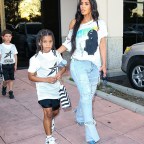 Busy mom Kim Kardashian heads home after Saint's basketball game!