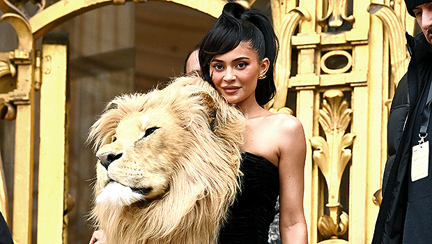 Kylie Jenner Wears Massive Faux Lion’s Head On Her Chest For ‘Beauty & The Beast’ Fashion Week Look