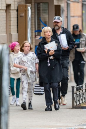 New York, NY  - *EXCLUSIVE*  - Lily Allen and David Harbour took her kids Marnie Rose and Ethel Cooper to a local bakery in NYC. The British star was holding a script for the play ‘The Pillowman’ during the outing.  Allen is set to star in Martin McDonagh’s West End revival of The Pillowman this year!

Pictured: Lily Allen, David Harbour

BACKGRID USA 28 APRIL 2023 

USA: +1 310 798 9111 / usasales@backgrid.com

UK: +44 208 344 2007 / uksales@backgrid.com

*UK Clients - Pictures Containing Children
Please Pixelate Face Prior To Publication*