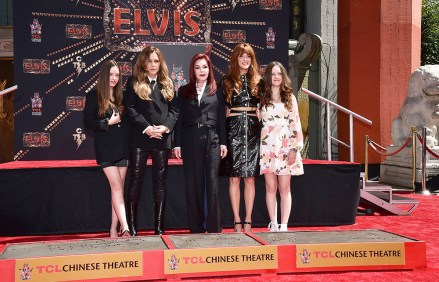 Harper Presley Lockwood, from left, Lisa Marie Presley, Priscilla Presley, Riley Keough and Finley Presley Lockwood, family members of the late singer Elvis Presley, pose after placing their hands in cement at a ceremony in honor of the Presley family, at the TCL Chinese Theatre in Los Angeles
Priscilla Presley, Lisa Marie Presley and Riley Keough Hand and Footprint Ceremony, Los Angeles, United States - 21 Jun 2022