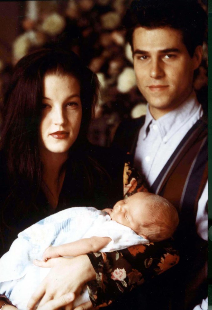 Lisa Marie & Danny Keough with their baby