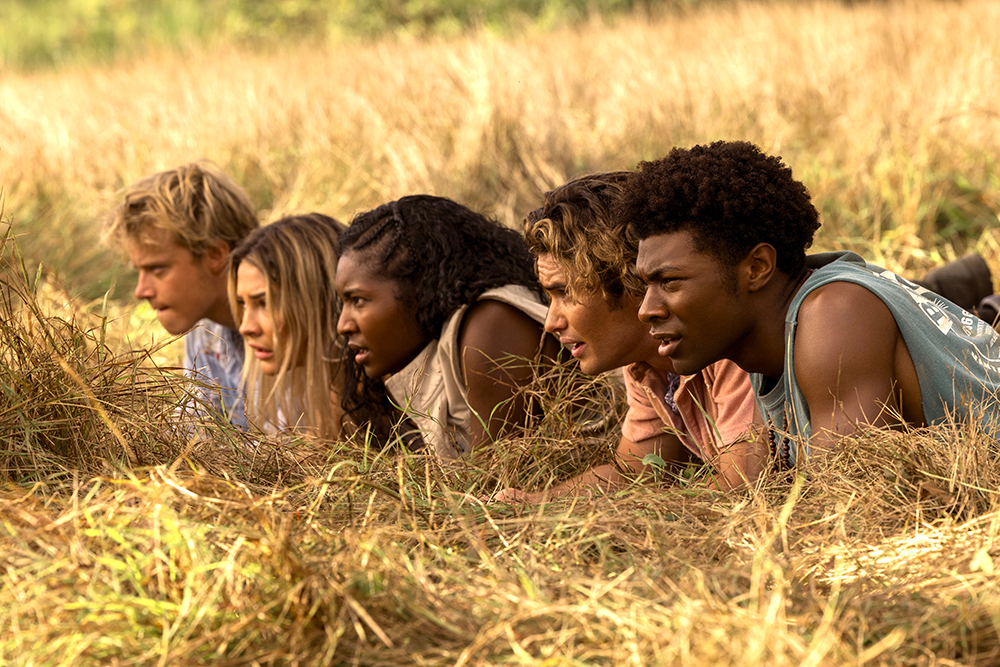 Outer Banks. (L to R) Rudy Pankow as JJ, Madelyn Cline as Sarah Cameron, Carlacia Grant as Cleo, Chase Stokes as John B, Jonathan Daviss as Pope in episode 301 of Outer Banks. Cr. Jackson Lee Davis/Netflix © 2022